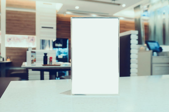 Blank Menu frame on Table in cafe restaurant