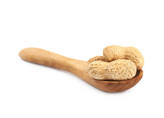 Spoon full of peanuts isolated