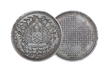 Old Chinese coin with guanyin isolated on white background.