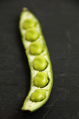 Bean pod on black background