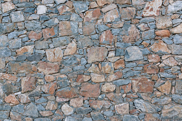 Stone wall background in Crete Island