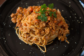 spaghetti pasta with tomato beef sauce closeup