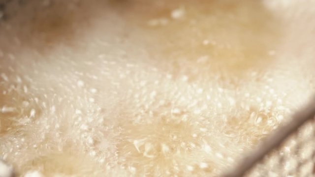 Tasty balls of forcemeat in boiling oil