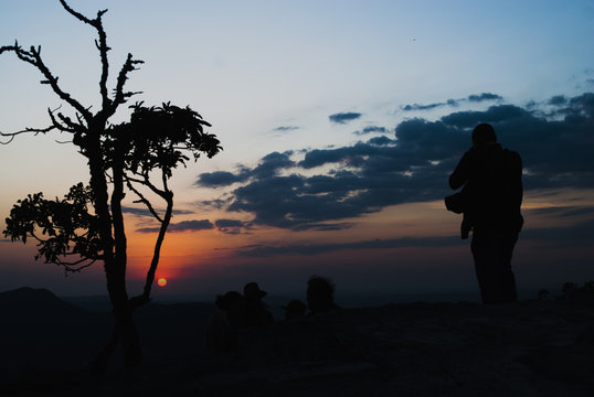 Photographer silhouette at sunrise in Brazil
