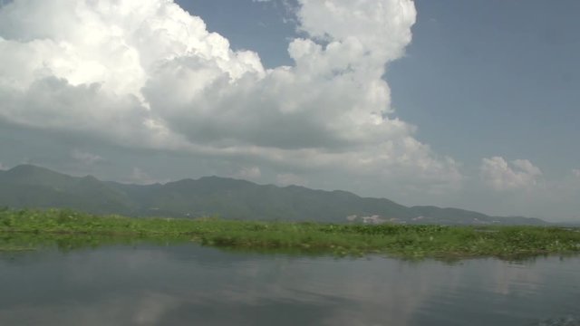 Inle lake, floating on lake and mountains on background