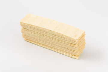 Golden chips on a white background. snack.