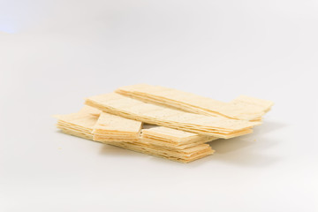 Golden chips on a white background. snack.