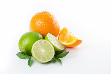 Fruit. Orange lemon lime and green mint leaves