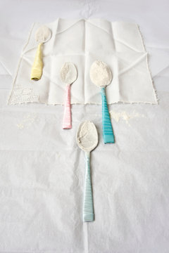 Spoons wrapped in ribbon