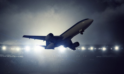 Airliner taking off . Mixed media