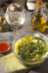 Portuguese soup Caldo Verde on the stone background