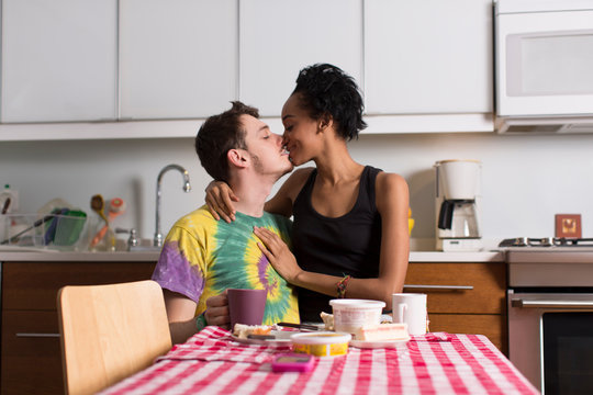 Young couple having breakfast