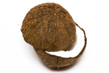 Coconut with a half on white background, closeup