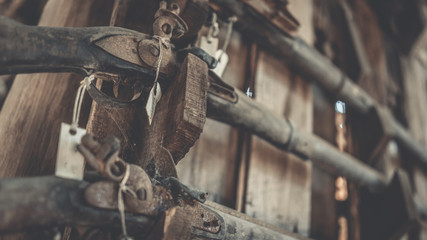 Key bolts on old wooden wall.