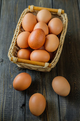 chicken eggs on wooden background