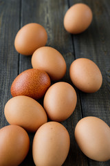 chicken eggs on wooden background