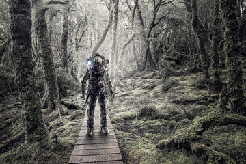 Naklejka premium Astronaut in forest . Mixed media