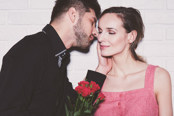 Giving roses to woman