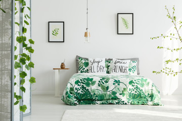 Botanical bedroom with white wall