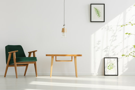 Home interior with green armchair