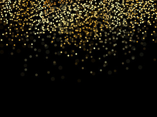 Gold confetti glitter on black background
