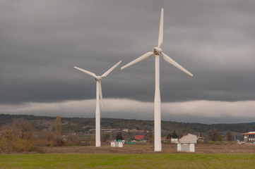 Fototapeta premium Wind turbine on a field