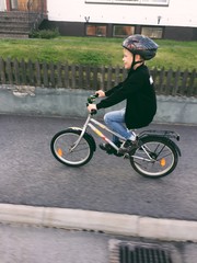 Boy on his bicycle