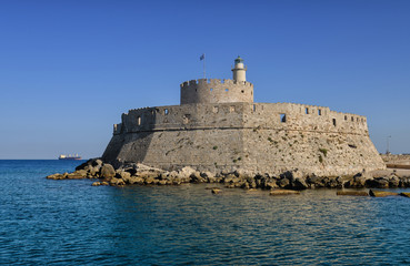 Fototapeta na wymiar Fort of St. Nicholas in Mandaki Harbor, Rhodes