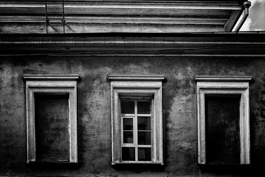 Vintage wooden house facade. Black and white toning. Moscow.