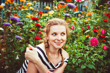 Woman in the summer garden