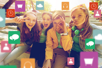 happy teenage students or friends having fun