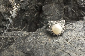 Old Pearl Ring on the Grunge stone