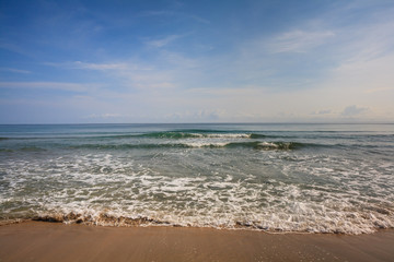 Fototapeta na wymiar Waves on a Sandy Caribbean Beach