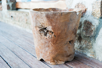 outdoor wooden bowl or vase on terrace floor