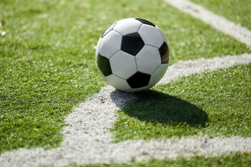 Fototapeta na wymiar soccer ball on football field