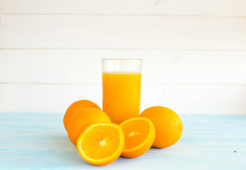 Glass of orange juice from above on vintage wood table. Empty ready for your orange juice, fruit product display or montage.
