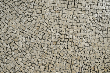 Old beige stone pavement background