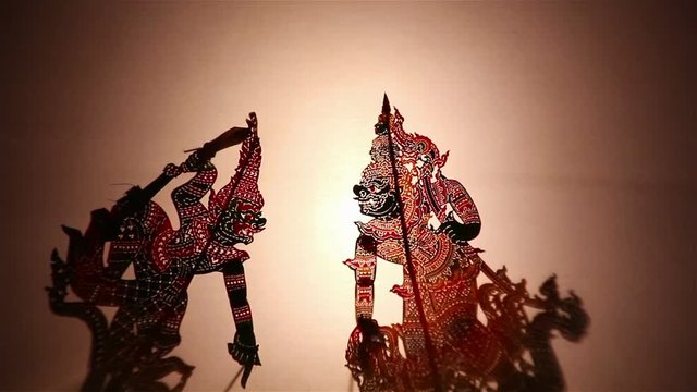 Thai shadow puppet show:Shadow play which is also known as shadow puppetry is an ancient form of storytelling and entertainment which uses flat articulated figures (shadow puppets)