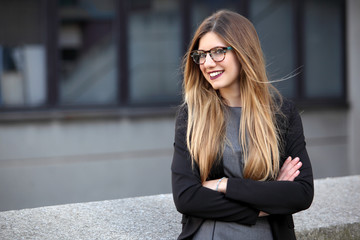 Happy smiling young businesswoman