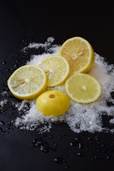 lemon with ice isolated on black