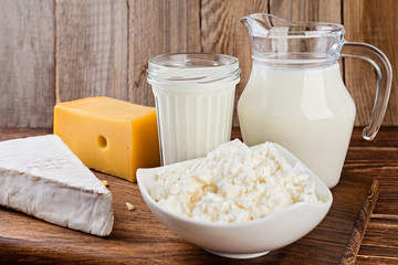 Dairy products on a rustic wooden table.