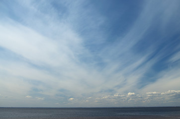 Blue sky with clouds background