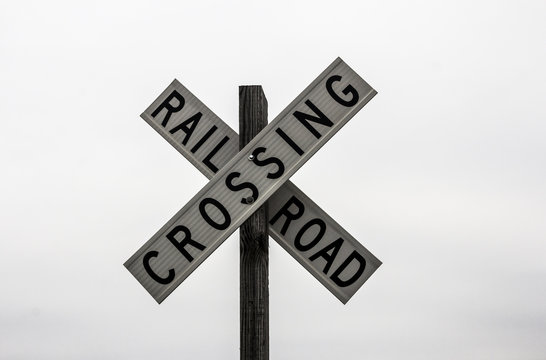 Railroad crossing sign on the white background