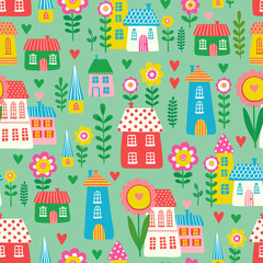 Vector seamless illustration of a cute children s cartoon style houses in among the flowers on a  green background. The pattern of the houses and plants.