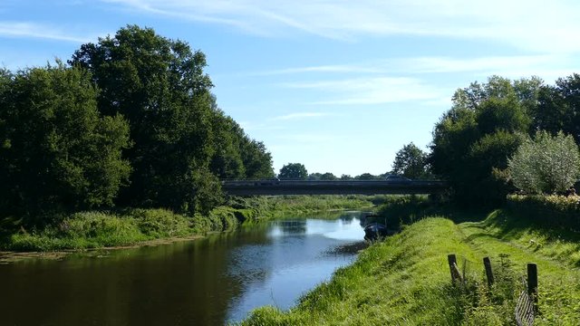 River with bridge in Dutch landscape