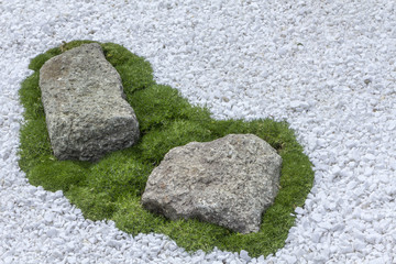 Japanese raked rock garden with pebbles
