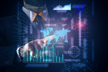 Obraz premium Man pointing at business charts