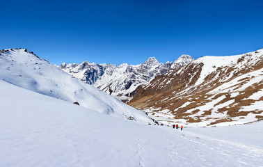 Fototapeta na wymiar Tourists on the way to Cho-La pass. Trek to Everest basecamp in Himalayan mountains, Nepal.
