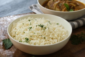 Cooked Long grain Basmati Rice served with chicken curry, selective focus