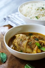Chicken Curry served with Cooked Basmati rice,selective focus
